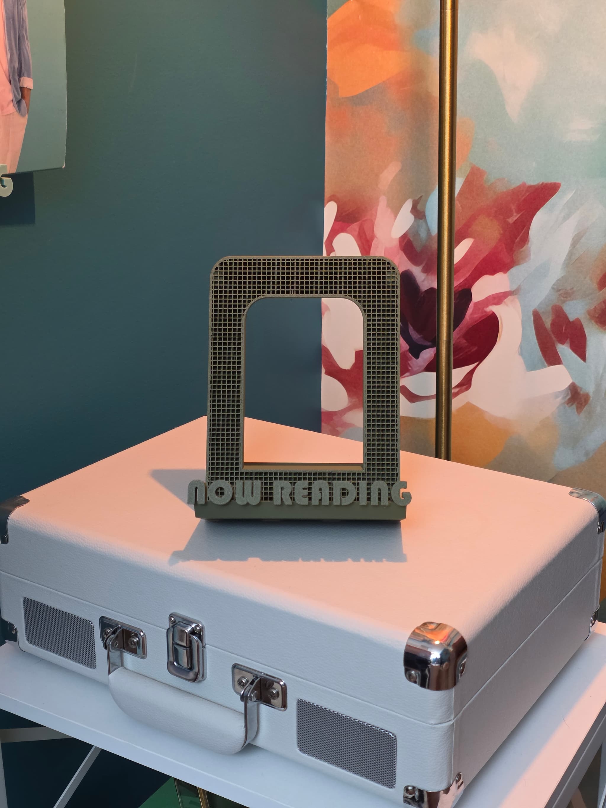 Now Reading Bookstand by Elusive Library